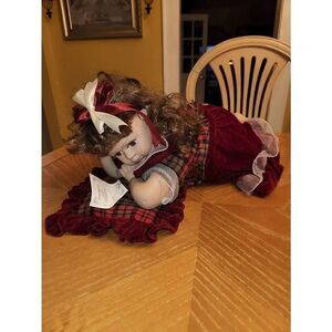 Vintage Porcelain brunette traditional doll collection